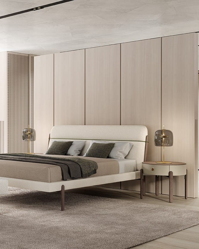 Styling around Iconic Furniture 5 a bed with a side table and a lamp